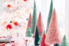 13 a colorful Christmas tablescape with super bright bottle brush Christmas trees, bold linens and porcelain is amazing