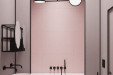 14 a chic modern light pink bathroom accented with matte black edges and lines looks very elegant and very bold