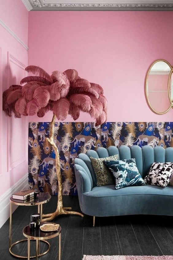 This bold and kitschy lamp will make your space jaw dropping, it's a gilded branch lamp with dusty pink feathers