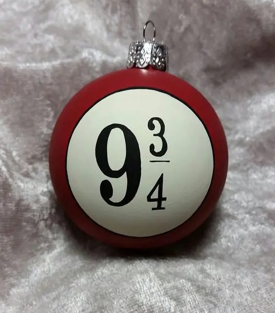 a bold and lovely HarryPotter-inspired Christmas ornaments with that platform number is a cool idea for your geeky holiday decor