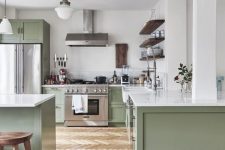 20 a chic contemporary kitchen in light green and white, with dark wooden touches and white countertops is very welcoming