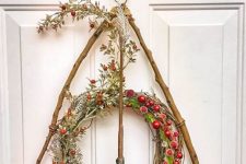 24 a pretty and creative Deathly Hallows Christmas wreath is agorgeous solution for Harry Potter fans