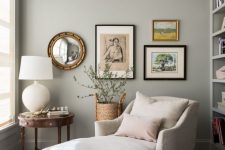 34 a lovely reading nook in dove grey, with a built-in bookcase, a neutral lounger, a mini gallery wall and a vintage side table