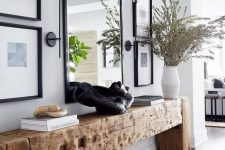 37 a gorgeous rough wood slab console table for a textural and unique look in the space