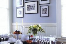a dining space with a cute gallery wall