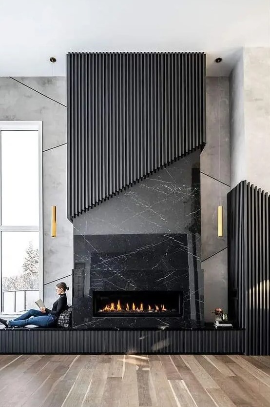 a fireplace with a fluted surround and a matching fluted storage panel is a cool and refined idea for a living room
