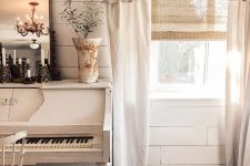 woven shades and neutral semi sheer draperies look very relaxed and laid-back and add interest to this shabby chic space
