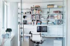 23 a contemporary glass enclosed home office with open shelves, a desk with storage, a white chair, a sleek white storage unit