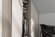 a Scandinavian space with a smart built-in attic wardrobe is a lovely idea to repeat, every inch of space is used