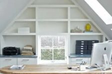 a cool attic home office design with practical shelves
