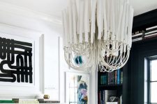 a living room with a gorgeous chandelier