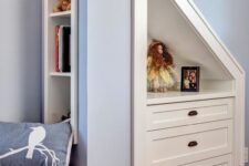 a small built-in niche and a second one with drawers is a cool solution to use that attic space that you have