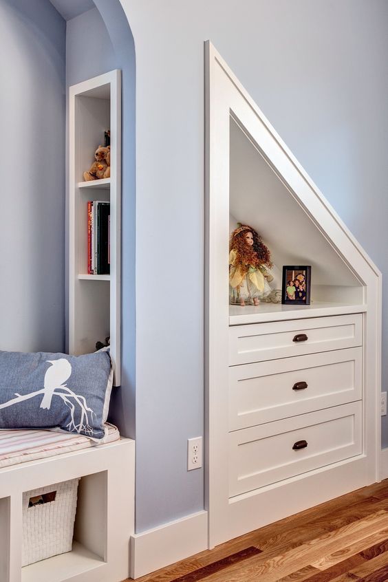 a small built-in niche and a second one with drawers is a cool solution to use that attic space that you have