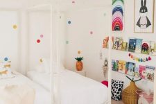a super cute shared kids room design