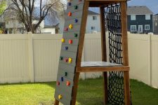 29 a kids’ climbing wall and climbing netted rop is a cool idea for super active children, it can be installed anywhere