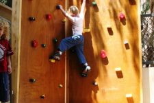 35 a small and pretty climbing wall like this one can be installed outdoors, even if you don’t have much space