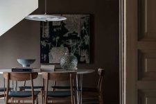 a neutral yet moody dining space