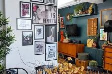 a smal gallery wall with pop art and matching black frames is a cool way to accessorize the space and make it cool