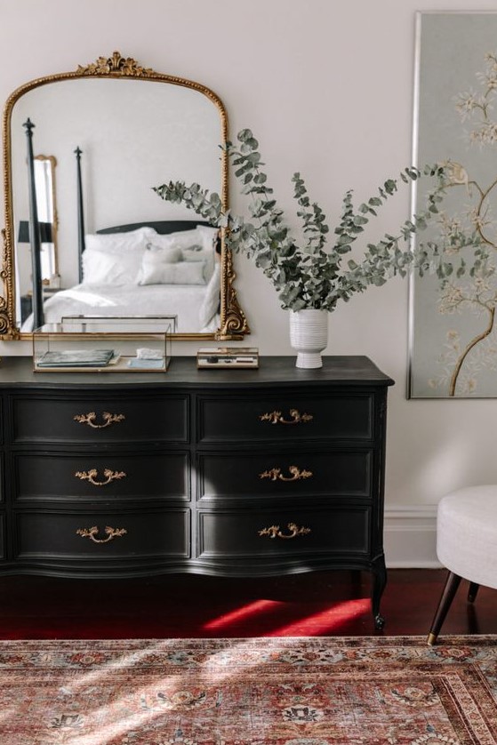 a black vintage dresser with refined handles is a beautiful solution for a bedroom, a living room or an entryway, and it can be a fit for many spaces