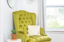 a bright modern nook with a vintage-inspired neon green chair that sets the tone in the space