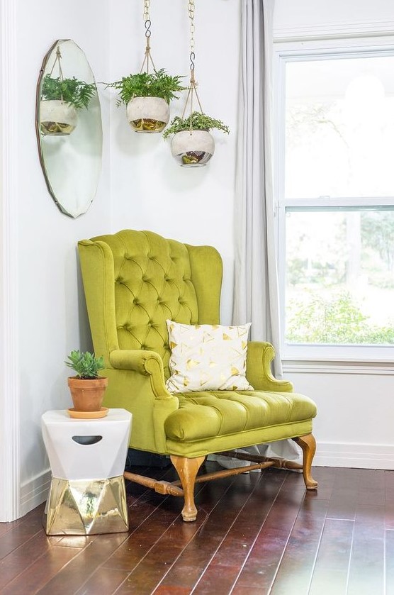 A bright modern nook with a vintage inspired neon green chair that sets the tone in the space