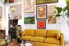 a large free form gallery wall with a bold color scheme and with vintage artworks will make the space more refined