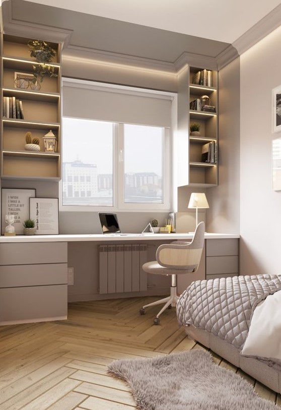 a stylish neutral teen bedroom with an upholstered bed, a study space by the window including drawers and open storage compartments plus a chair