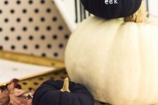 08 matte black mini pumpkins with white letters are amazing for stylish modern Halloween decor