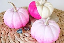 12 DIY ombre and color block pumpkins in the shades of pink are a great idea for a pink Halloween space