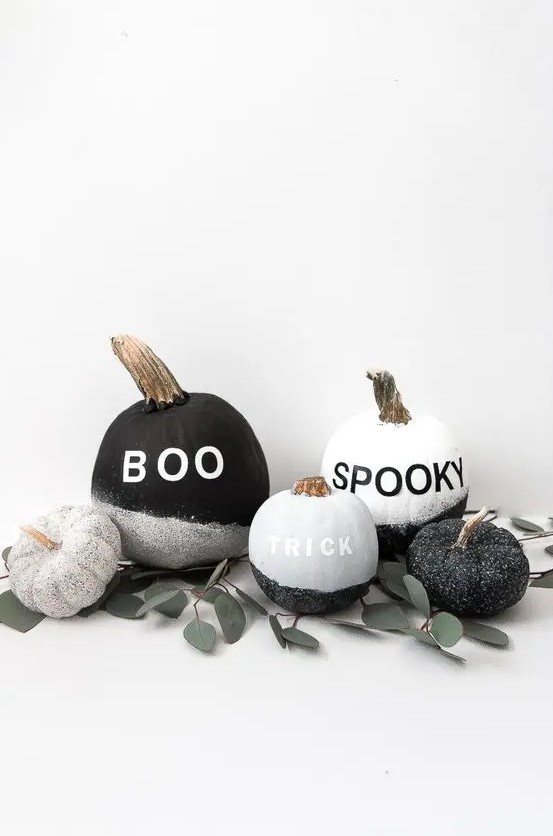 Make a display of cool black and white glitter pumpkins with vinyl letters   they are very easy to DIY