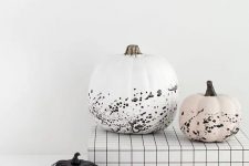 14 gorgeous modern Halloween pumpkins – a white, black and blush one with splatters are awesome