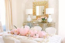 17 a chic glam Halloween table setting with pink velvet pumpkins, gold touches and white plates