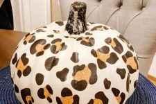 18 a faux pumpkin with a cheetah print is a bold and trendy idea to decorate your home for the fall
