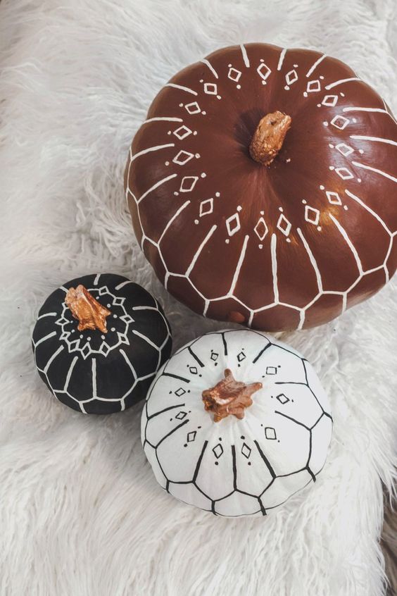 classy painted pumpkins decorated with white and black sharpies are amazing for boho fall or Halloween decor