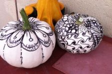 22 stylish and cool black and white pumpkins decorated with a black sharpie are a nice idea for Halloween, they look cute