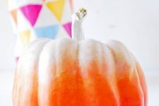 29 an ombre pumpkin in white, orange and pink is a bold and cool decoration not only for fall but also for Halloween
