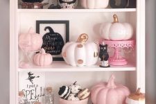 32 pretty Halloween decor with pink, blush and gold pumpkins, cats, stands and scary details is a gorgeous idea for this holiday