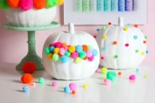 34 colorful pompom pumpkins will easily fit Halloween, fall and Thanksgiving parties in bold shades
