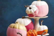 39 modern color block Halloween pumpkins in white, pink, burgundy, gold and orange is a great idea for bold Halloween decor