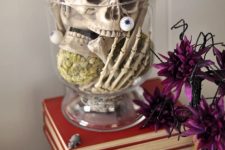 10 a clear bowl with a skull, skeleton hands, eyeballs and mice is a very easy last-minute Halloween decoration or centerpiece