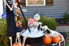 23 a fun and cool Halloween scene with a bathing skeleton, a skeleton in an apron and a dog skeleton is all fun