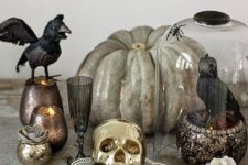 24 a heirloom pumpkin, a crow in a cloche, blackbirds, candles in chic candleholders for Halloween