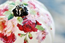 25 a white pumpkin with pink and red decoupage blooms and a black stem is a gorgeous idea for the fall and Thanksgiving
