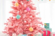 09 a cool candy pink Christmas tree decorated with a bit of pastel-colored ornaments looks gorgeous, modern, fresh and very pretty