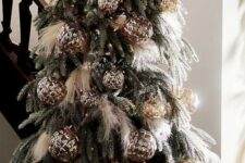 12 a creative boho Christmas tree with pampas grass and stylish brown ornaments and lights is a bold and catchy idea
