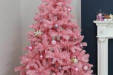 15 a pink Christmas tree decorated with pink and mauve ornaments and little gift boxes is a lovely idea