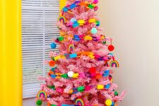 16 a pink Christmas tree decorated with super bold ornaments and chains of paper is a bold idea for a kids’ space