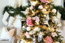18 a Christmas tree with blush, pink and white blooms of a large size, gold mesh ribbon is a bold and catchy idea for a boho space