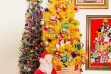 34 a yellow Christmas tree decorated with bold vintage ornaments and placed into a basket is a fun and bold idea to rock