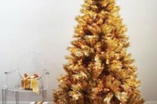 53 a gold pre-lit Christmas tree doesn’t require any ornaments or decorations as it’s bold itself